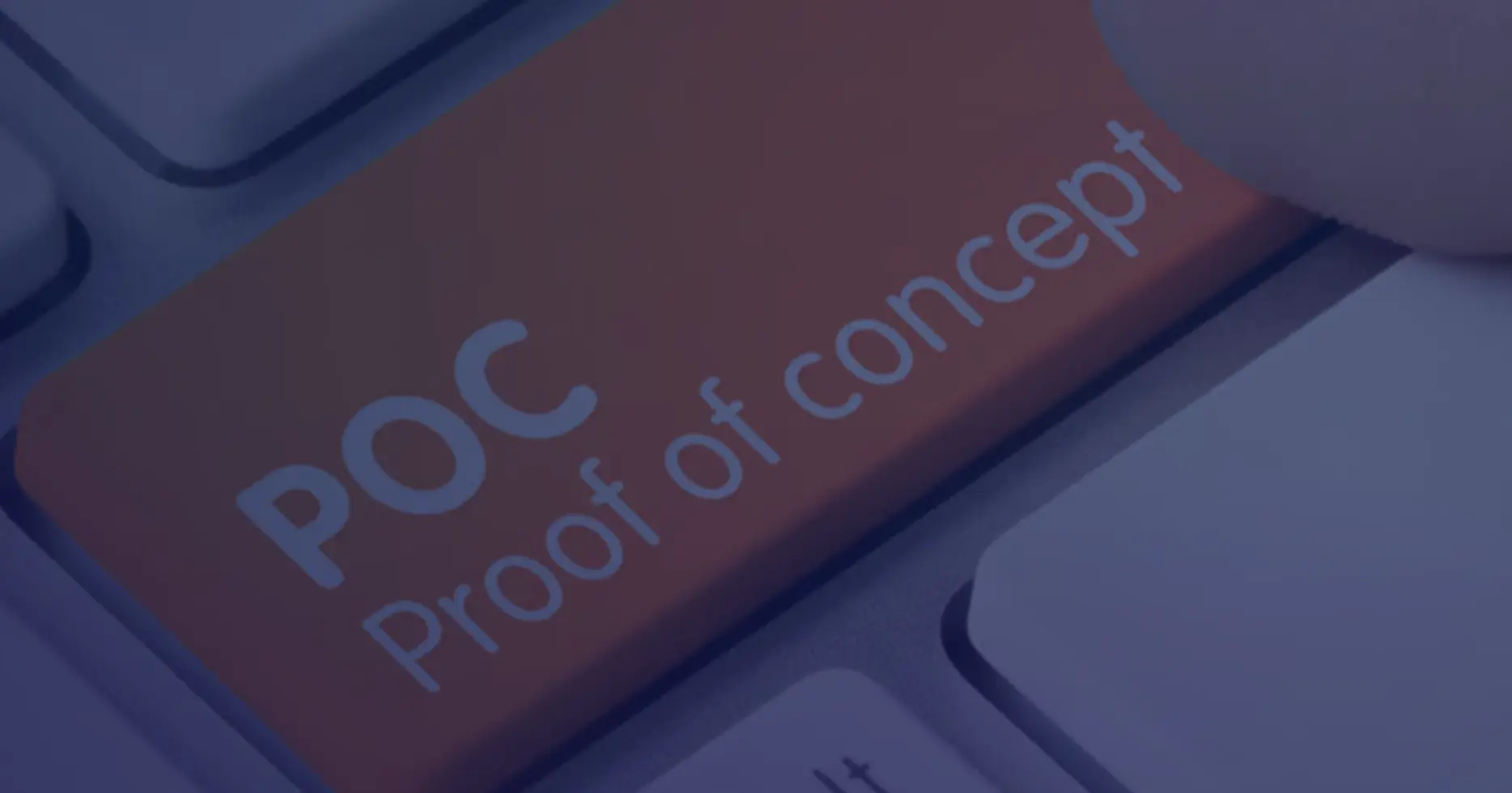 A red "POC - Proof of Concept" key on a keyboard next to an alt key, indicating testing or validation in a cloud environment.