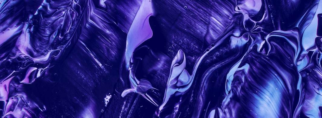 A screen with purple and blue colored waves and a black background